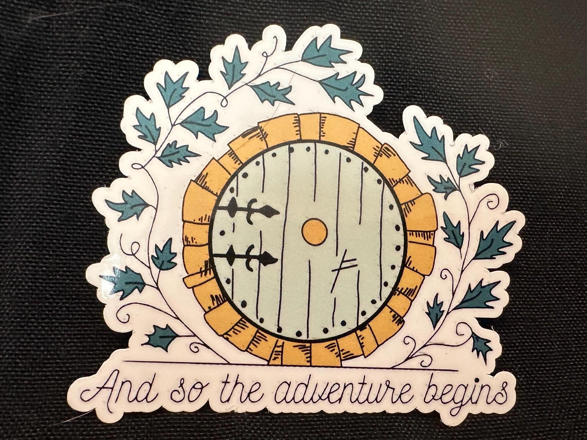 Closeup of the Adventure Begins Sticker