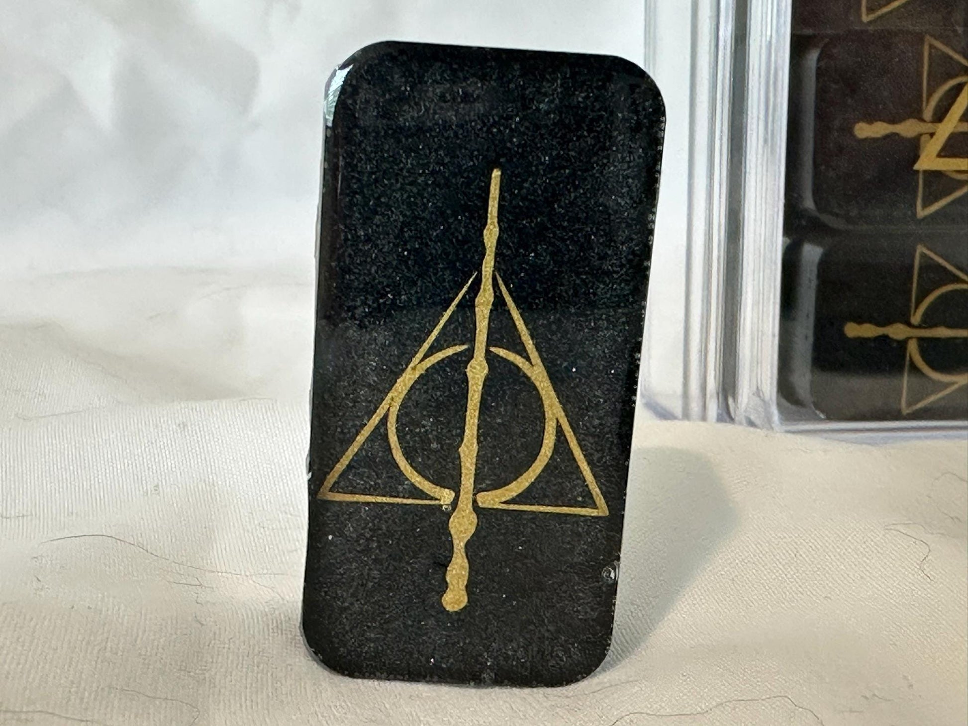 Closeup of the Deathly Hallows symbol