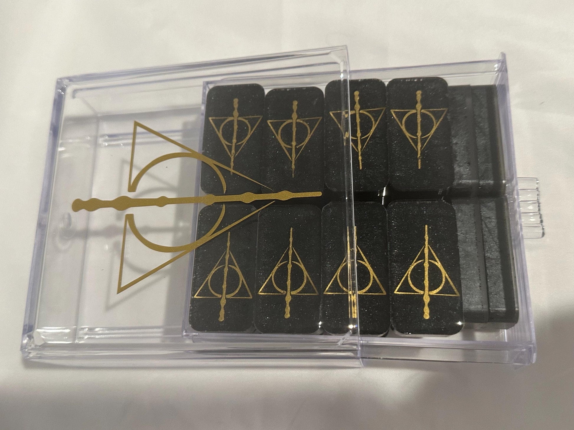 Deathly Hallows dominoes in case with the drawer open ready to be played with