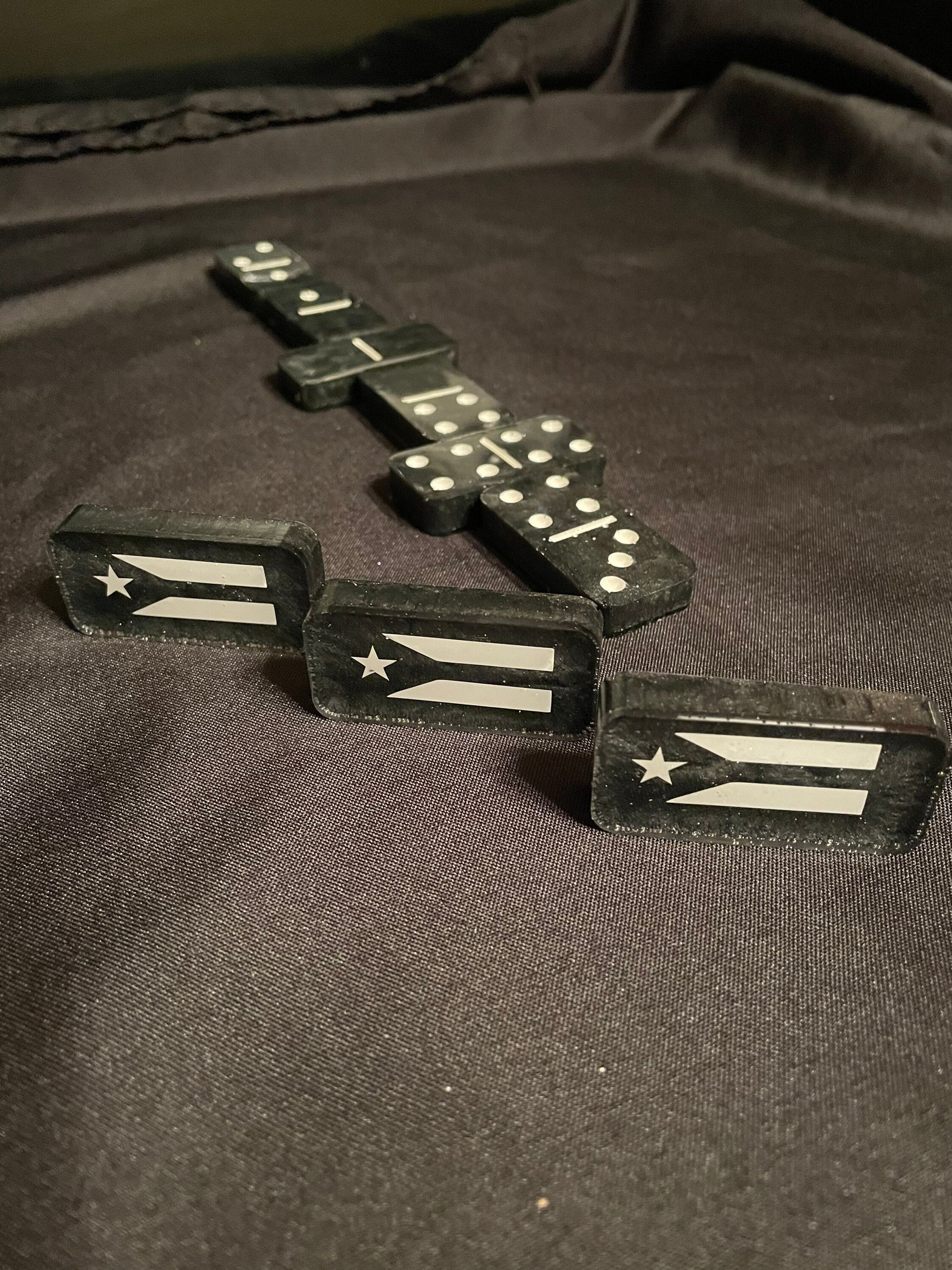 Puerto Rico Resistance dominoes sowing off the design and the dots and lines